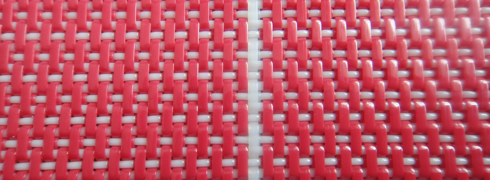 What are the material properties and wear resistance of polyester mesh belt?